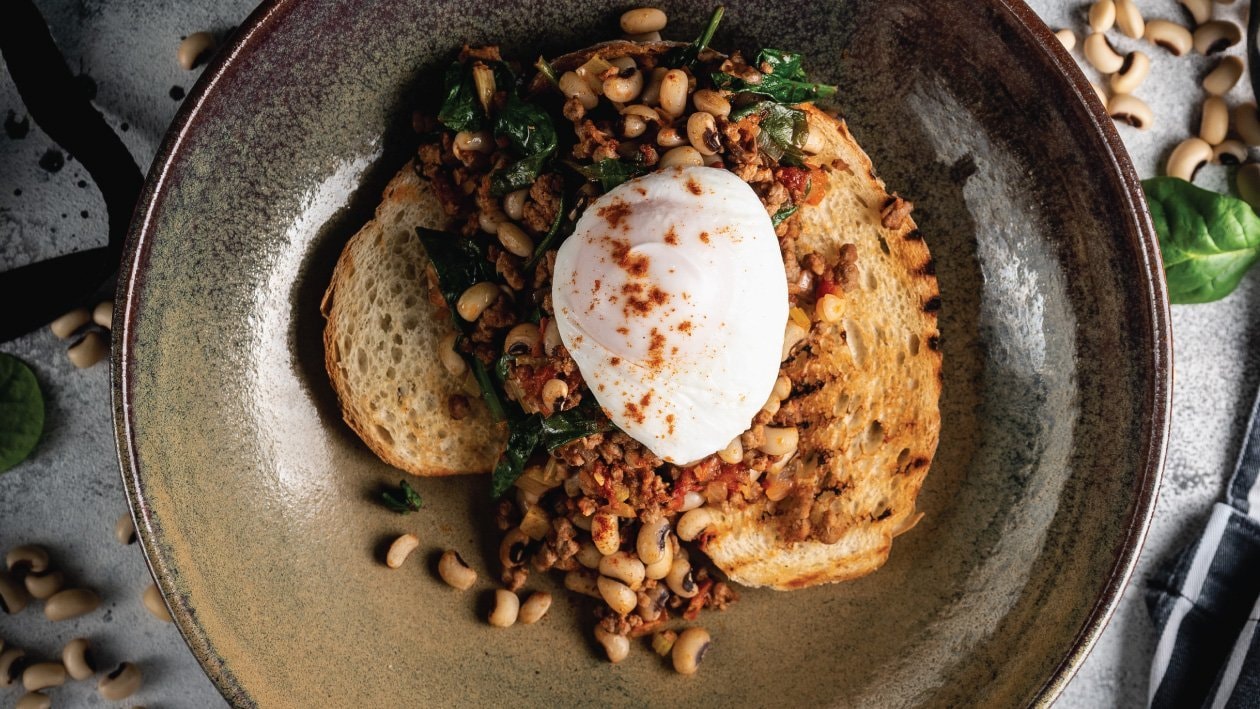 Braised Cow Peas on Toast and Poached Egg