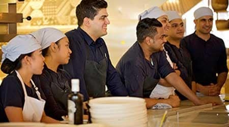 Chefs in training smiling