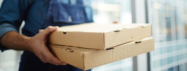 Delivery man carrying food-to-go Delivery man carrying food-to-go